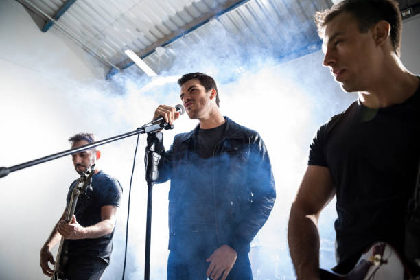istock Trio playing music on stage 966648946