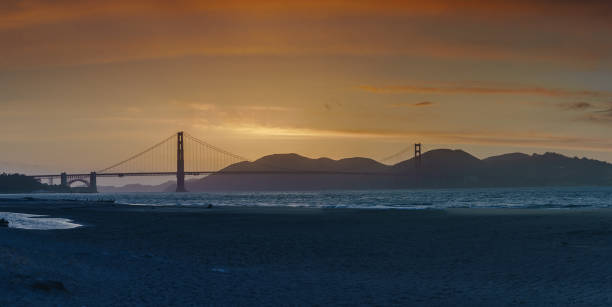 istock Golden Gate Bridge Sunet view from Crissy Field 966663922