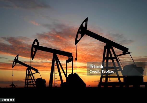 Silhouette Three Oil Pumps Stock Photo - Download Image Now - Black Color, Color Image, Contrasts