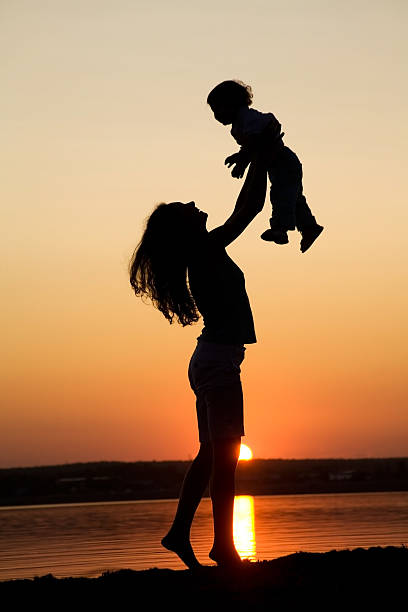 istock Mother and daughter on sunset 96667422