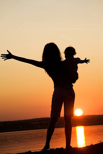 istock Mother and daughter on sunset 96667777