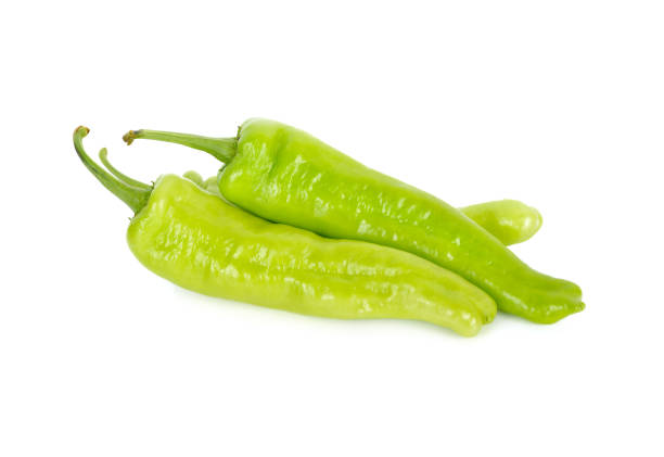 istock fresh green chili peppers with stem on white background 966679788