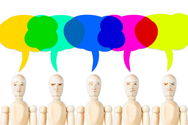 istock Many people with empty bright multicolored speech bubbles over their heads. Conceptual image with wooden puppets 966692194
