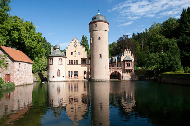 Mespelbrunn, Germany - July 21, 2007: The medieval moated castle at Mespelbrunn, originally built in the 15th Century, it is one of the most visited water castles in Germany.