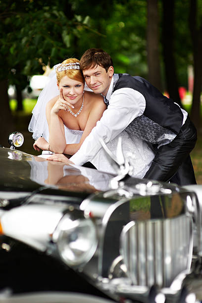 istock Groom adn bride about retro limousine 96669979