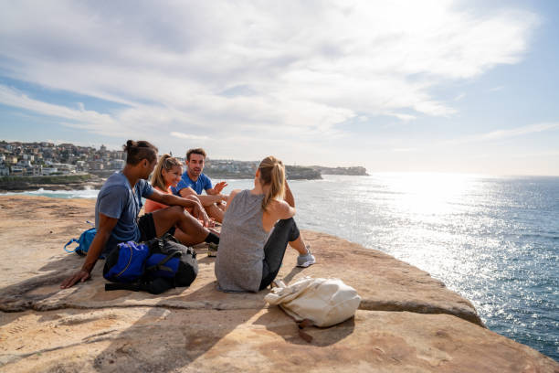 istock Group of friends hiking and taking a break 966705842