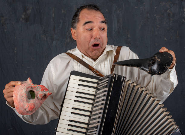 istock Commedia dell Arte performer in il Capitano costume performs for the camera. 966722106