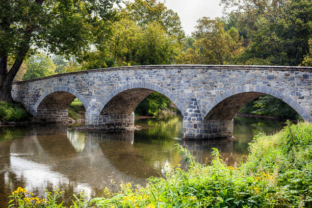 Burnside's Bridge In Antietam National Battlefield In Sharpsburg, Maryland, USA Burnside's Bridge was built in 1833 and was fought over during the American Civil War. harpers ferry photos stock pictures, royalty-free photos & images