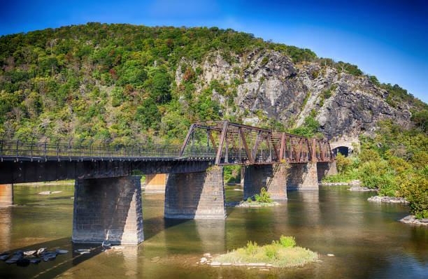 Railroad Bridge Across The Potomac In Harpers Ferry, West Virginia, USA Bridge from Harpers Ferry, West Virginia harpers ferry photos stock pictures, royalty-free photos & images