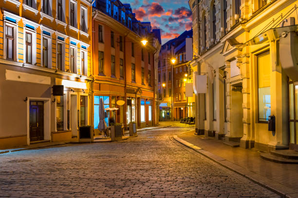 Early morning in medieval district in old Riga. The city is capital of Latvia  and offers for tourists unique architectural Gothic ensembles and rare ancient buildings