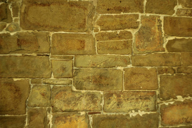 istock Wall of natural brown stone. 966746662