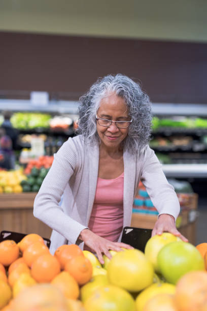 istock Senior woman grocery shopping 966762454