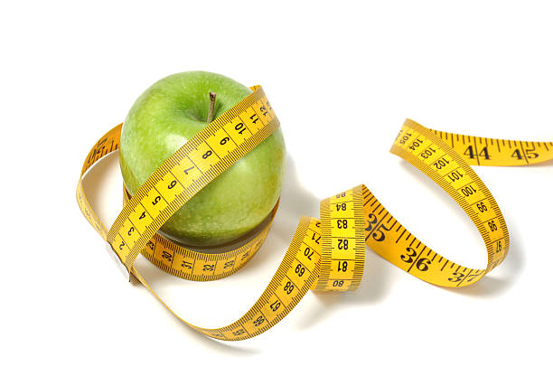 istock Apple and measure tape 96676375