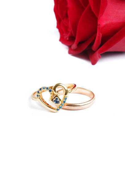 istock Close-Up Of Rings And Rose Over White Background 966765606