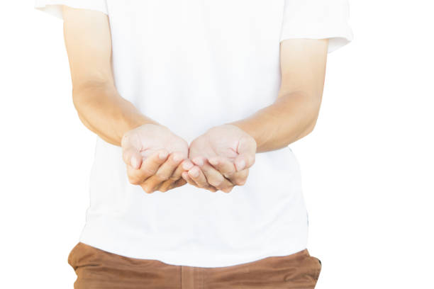 istock Midsection Of Man With Hands Cupped Standing Against White Background 966765728