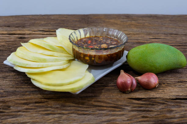 istock Raw mangoes sour with Sweet fish sauce 966766516