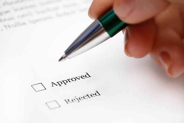 istock Hand with pen, approved or not? 96677605