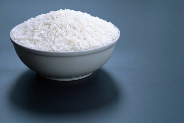 istock bowl of jasmine white rice on black backgrounds 966776874