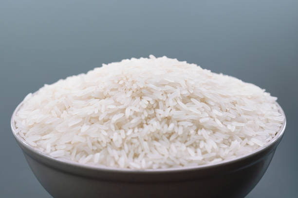 istock bowl of jasmine white rice on black backgrounds 966777844