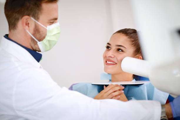 istock Female patient on dental examination 966781596