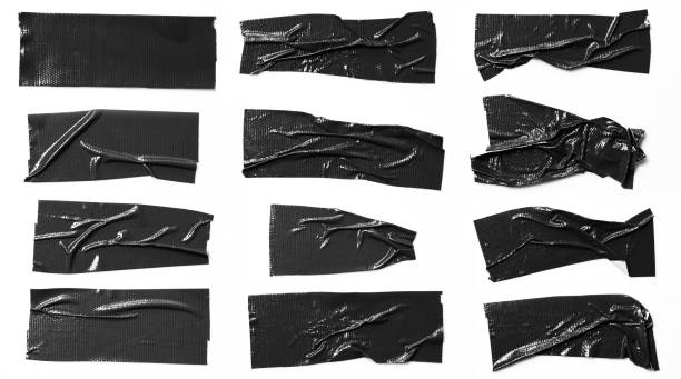 istock Set of black tapes on white background. Torn horizontal and different size black sticky tape, adhesive pieces. 966787106
