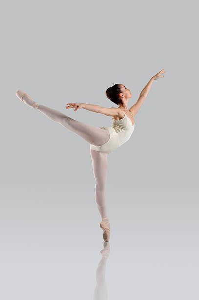 istock On tip toes she reaches out 96678969