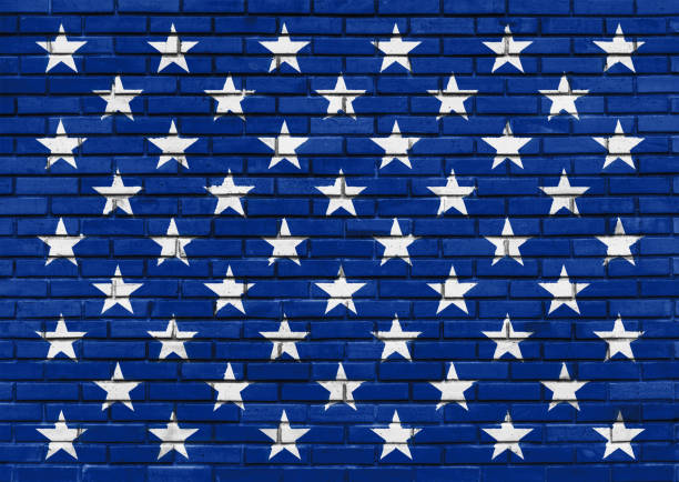 istock Fifty White Stars on the painted blue brick wall, American Flag theme, decorative background 966795928