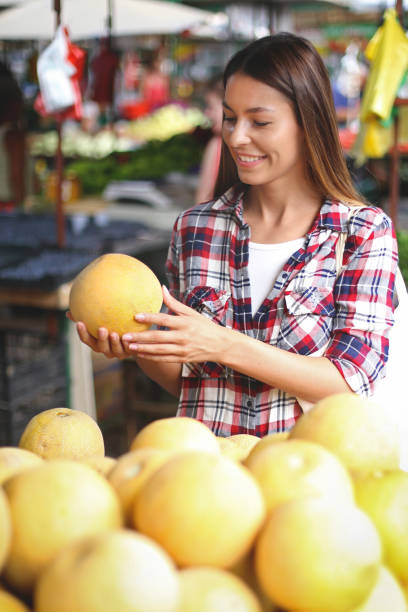 istock Young woman at a market 966804182