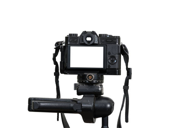 istock A Professional digital mirrorless camera on tripod on white background, Camera for photographer or Video, Live Streaming equipment concept 966817874