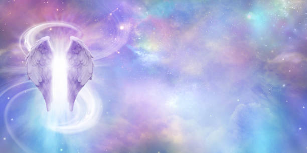 Heavenly Angel Spirit Banner a pair of Angel Wings with a swish of white energy behind set against a wide vivid cosmic Universe background with copy space pics of guardian angels stock pictures, royalty-free photos & images