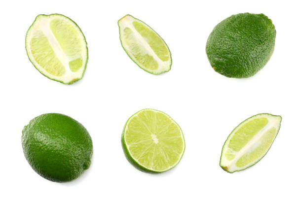 istock healthy food. sliced lime isolated on white background top view 966823070