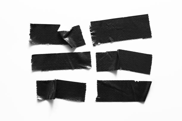 istock Set of black tapes on white background. Torn horizontal and different size black sticky tape, adhesive pieces. 966823280