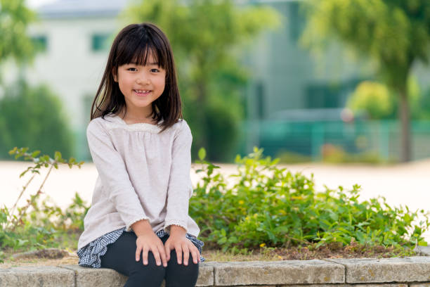 портрет молодой девушки - japanese girl стоковые фото и изображения