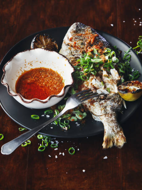istock Barbecued whole snapper with sauce 966830250