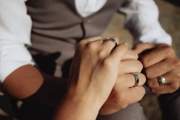 istock Young couple in love  holding hands 966830398