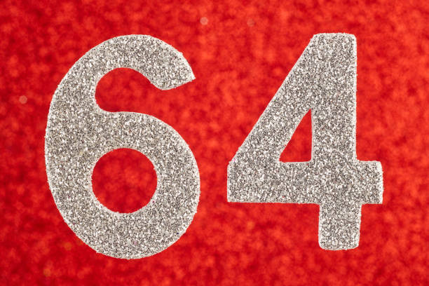 istock Number sixty-four silver color over a red background. Anniversary 966835264