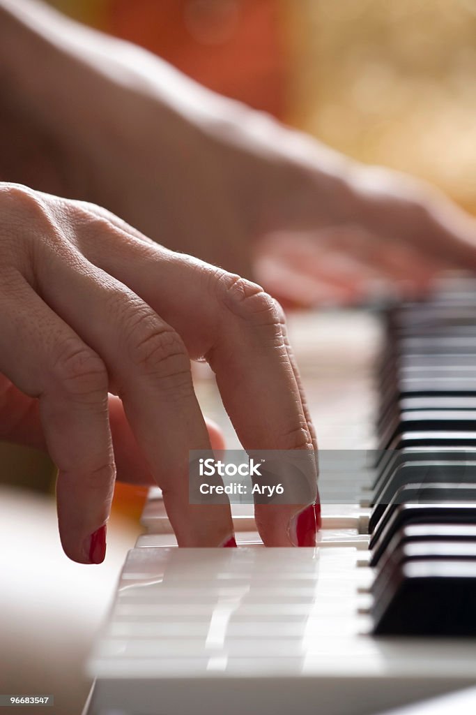 Pianista - Foto stock royalty-free di Arancione