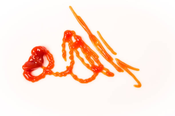 istock Tomato sauce isolated on white background. Red ketchup splashes isolated on white background, top view 966845306