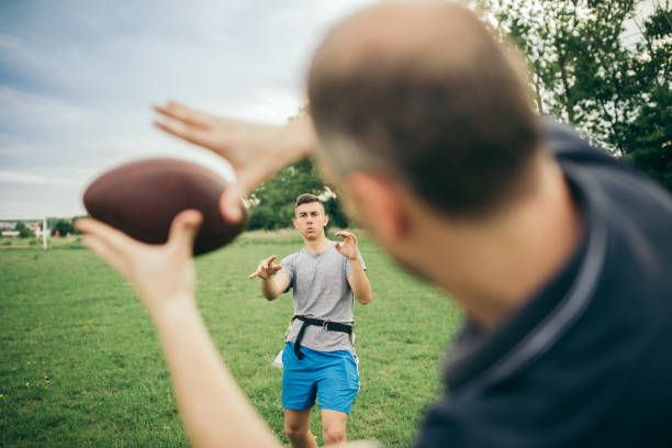 istock Amateurs playing american football 966845428