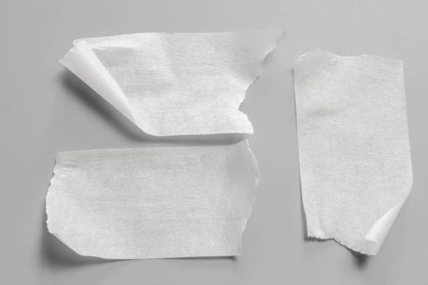 istock Set of white tapes on gray background. Torn horizontal and different size white sticky tape, adhesive pieces. 966853926