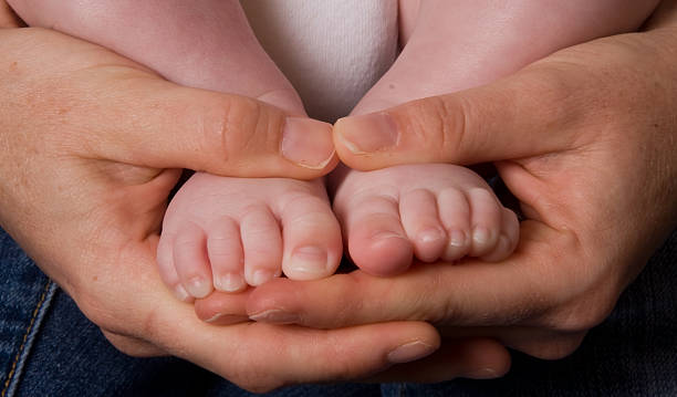 Baby Little feet stock photo