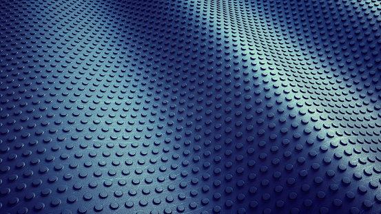Irregular superficie artificial hecha de material de goma oscura photo
