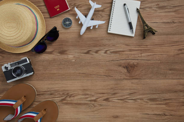 istock travel gadgets in wood textures background 966860396