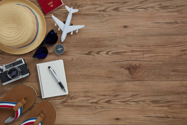 istock travel gadgets in wood textures background 966860468