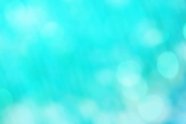 istock light blue color abstract background with blurred defocus bokeh light for template 966860568