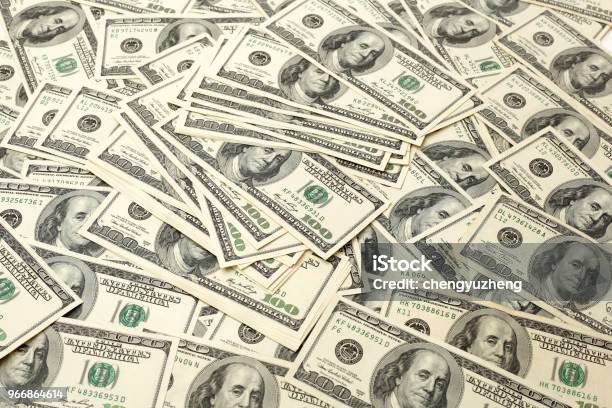 Pile Of Banknotes Of One Hundred Dollars Selective Focus Closeup Background Stock Photo - Download Image Now