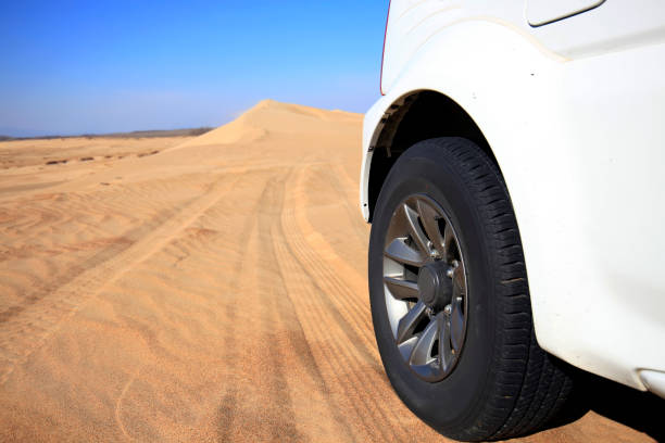 istock An suv was driving in the desert 966865652