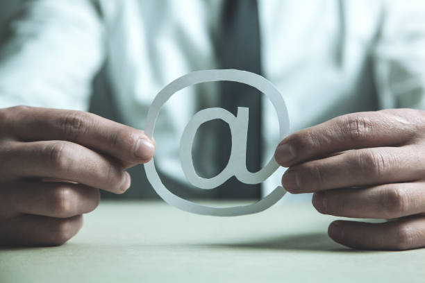 istock Businessman showing paper email symbol. 966865930