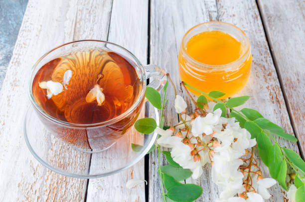 istock Acacia tea close up on wooden tables 966870192