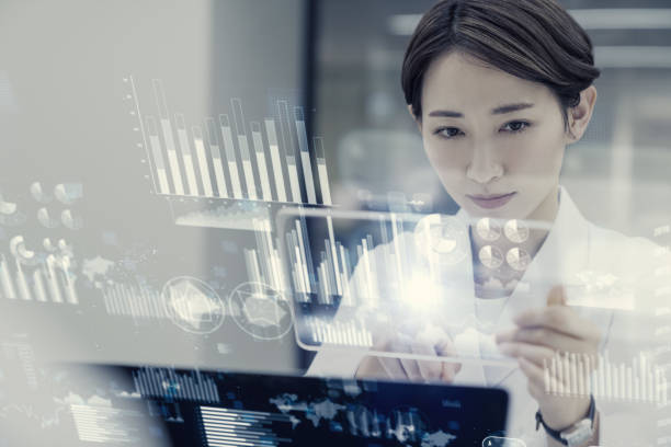 Female scientist looking futuristic GUI.